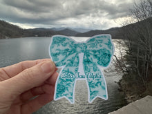 Load image into Gallery viewer, Sticker | ZTA_E | Zeta Tau Alpha Toile Bow | Waterproof Vinyl Sticker | White | Permanent | Removable | Window Cling | Glitter | Holographic
