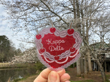 Load image into Gallery viewer, Sticker | KD_C | Kappa Delta Heart Shaped Cake | Waterproof Vinyl Sticker | White | Clear | Permanent | Removable | Window Cling | Glitter | Holographic