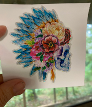 Load image into Gallery viewer, Sticker | 46B | Human Skull with Feather Headdress | Waterproof Vinyl Sticker | White | Clear | Permanent | Removable | Window Cling | Glitter | Holographic